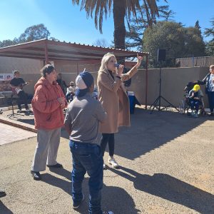 Benice Borman singing at the annual fun walk