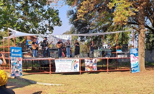 Band playing on stage at the gospel concert