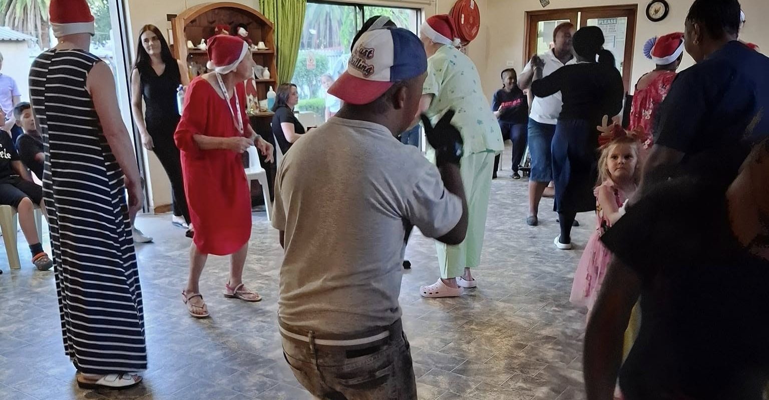 Residents dancing at Christmas Dance 2024 at Vita Nova