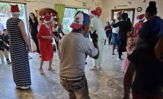 Residents dancing at Christmas Dance 2024 at Vita Nova