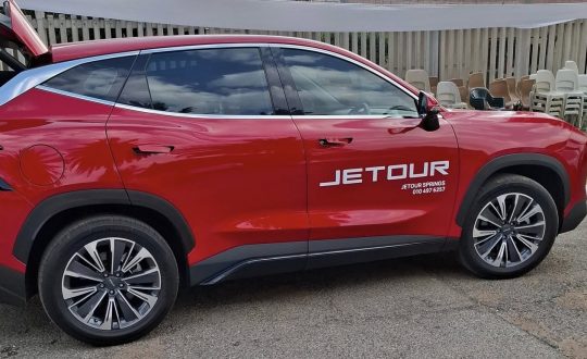 Red Jetour Springs branded vehicle