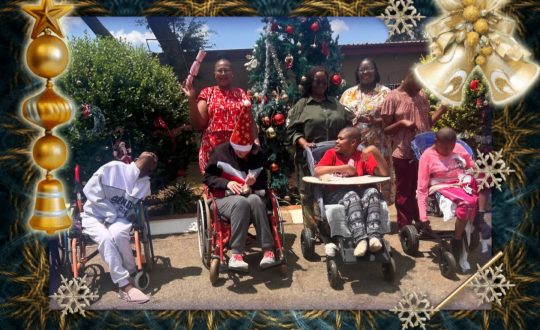 Staff members with residents celebrating Christmas