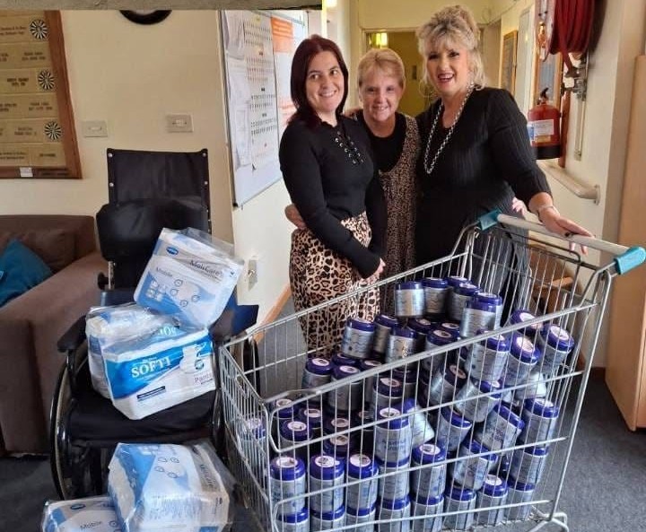 Photo of Nadia and Michelle from Vita Nova with donations from Martie De Villiers